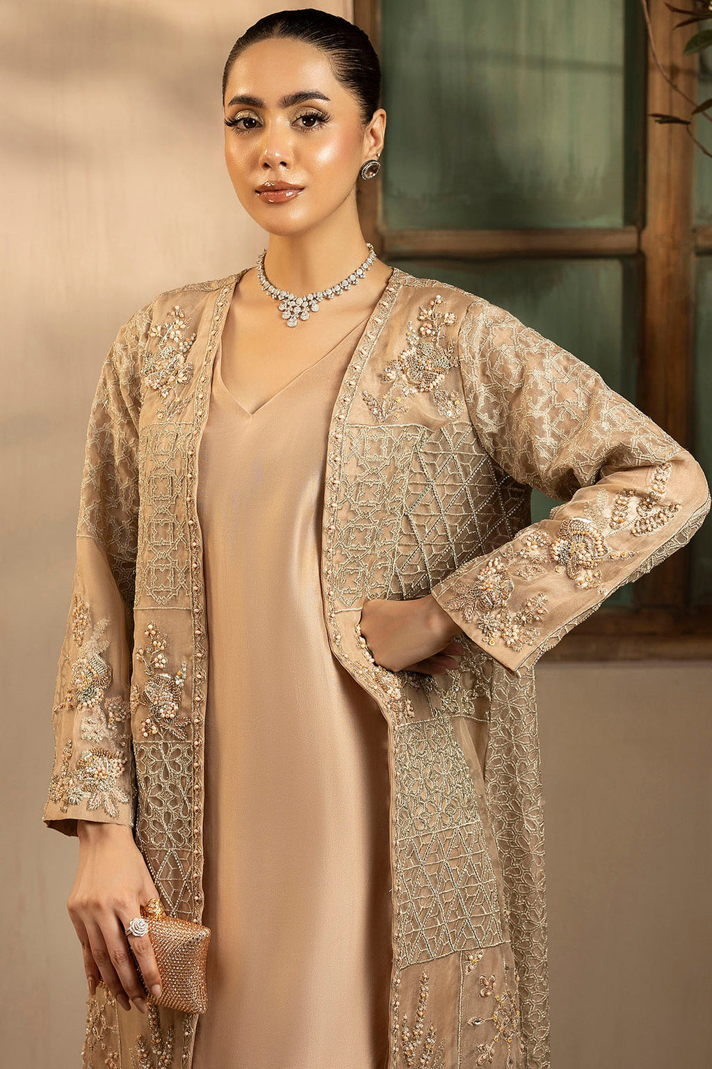 "Detailed drape view of the light embroidered organza dupatta paired with the Motifz 0076 Arisha suit from Mirha Collections."