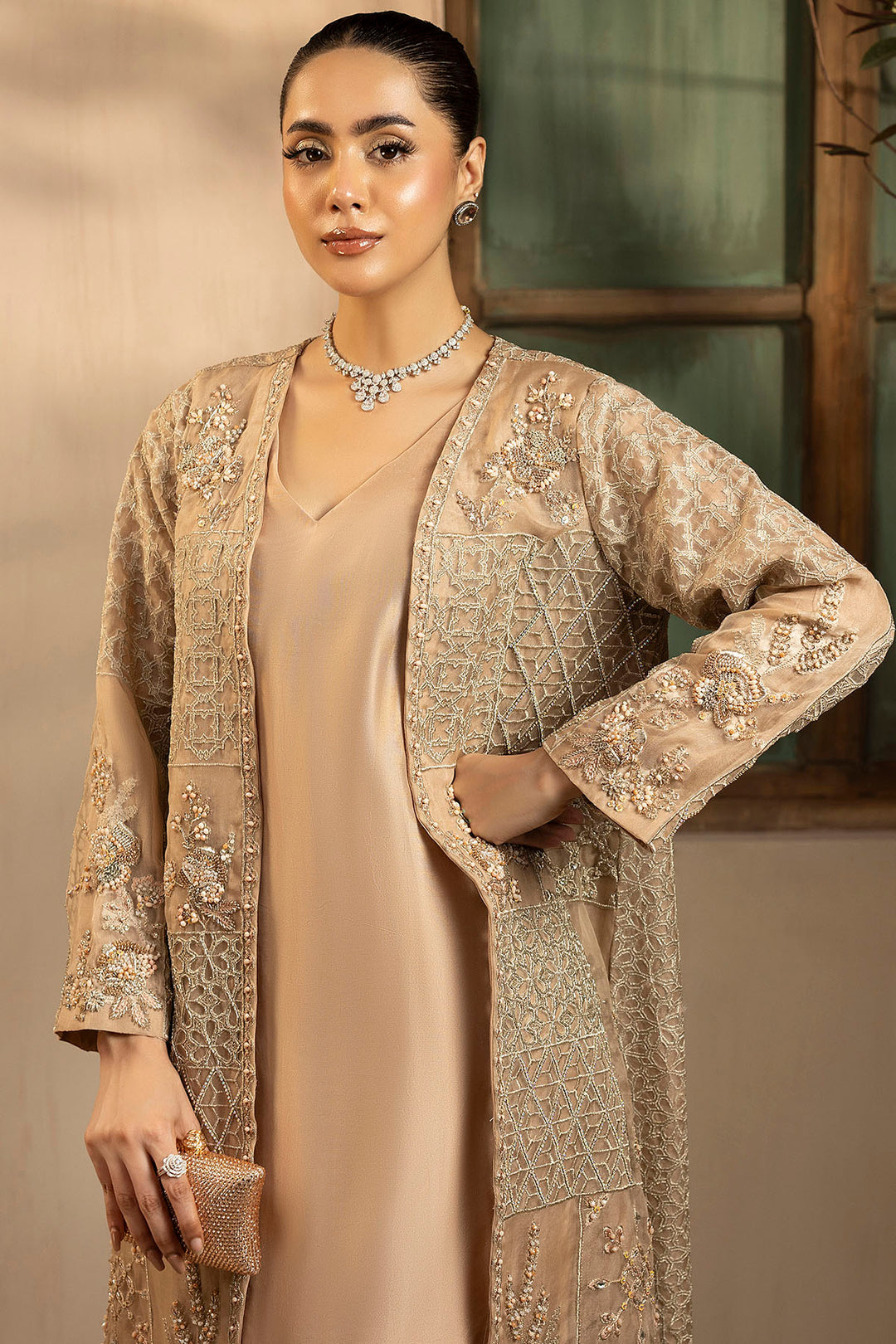 "Detailed drape view of the light embroidered organza dupatta paired with the Motifz 0076 Arisha suit from Mirha Collections."