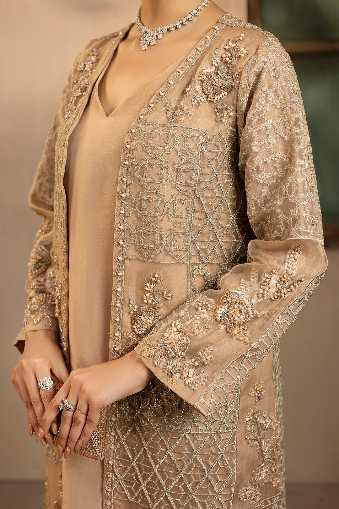 "Detailed drape view of the light embroidered organza dupatta paired with the Motifz 0076 Arisha suit from Mirha Collections."