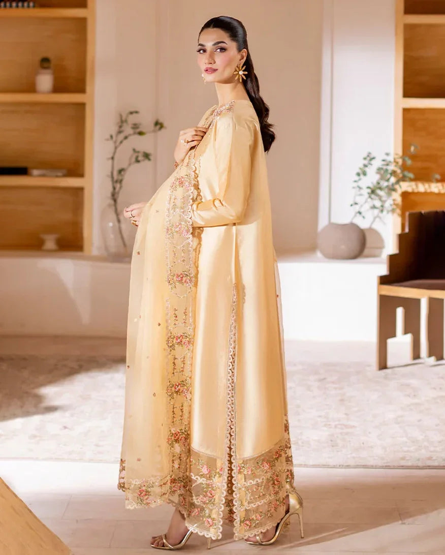 "Focus on the intricate sleeve cuff trimmings and lace hemline details of the Mushq Aurea stitched luxury suit, showing boutique-quality tailoring."