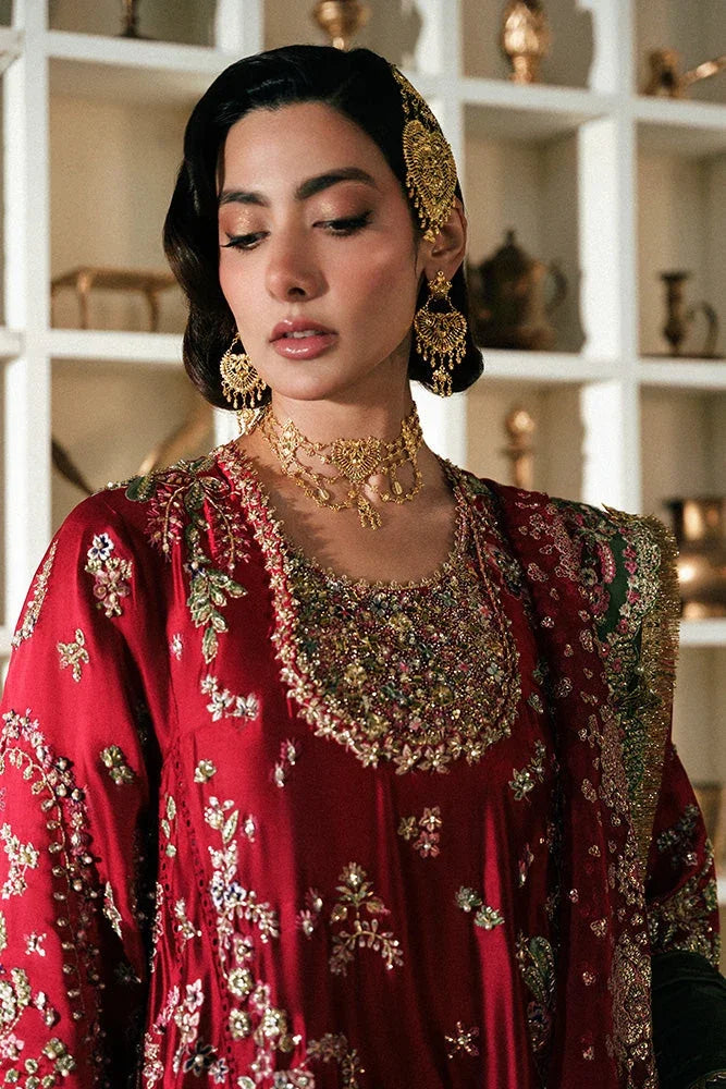 "Close-up of hand-worked zardozi, sparkling sequin accents, and resham threadwork embroidery on the Suffuse Afsanae shirt bodice."
