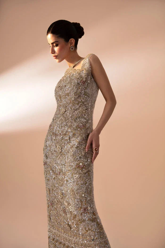 "Detailed view of intricate embroidered organza borders and cutwork daman finishings on Mysie by Tahira Ashley formal suit."