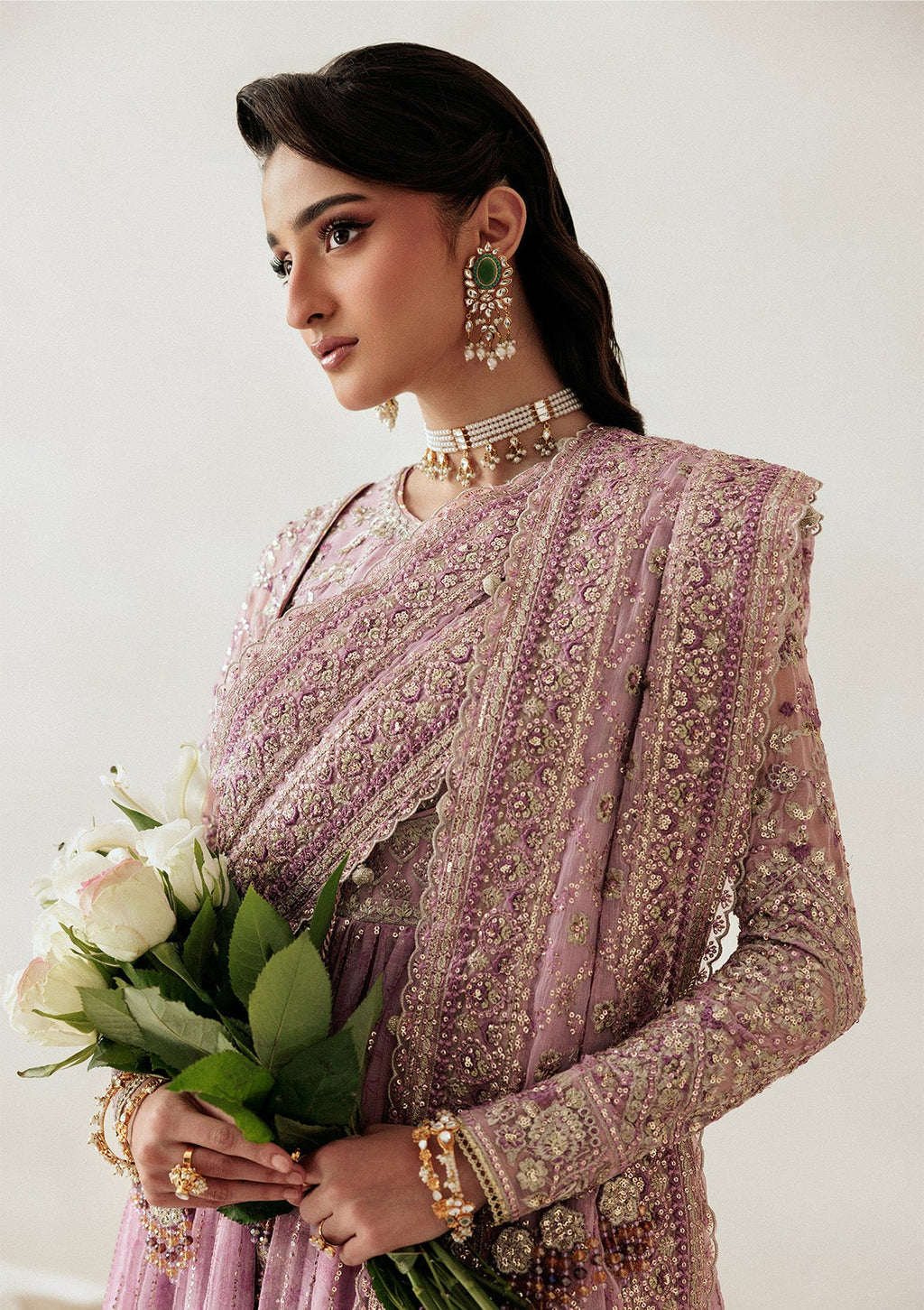 "Close-up detailing on the Aik Shaam Look A2601 bodice, highlighting intricate gold tilla embroidery, shimmering sequins, and fine hand-placed embellishments along the neckline."