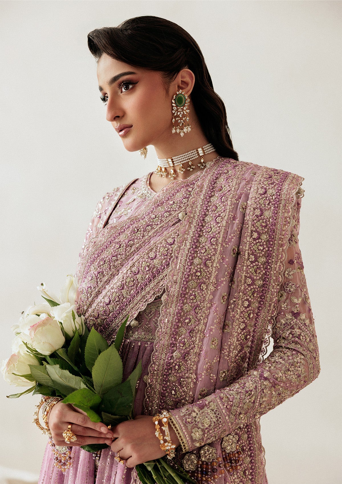 "Close-up detailing on the Aik Shaam Look A2601 bodice, highlighting intricate gold tilla embroidery, shimmering sequins, and fine hand-placed embellishments along the neckline."
