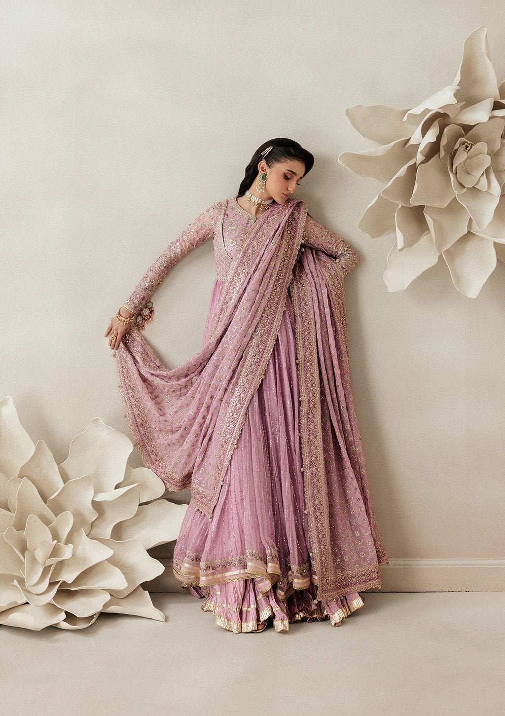 "Mirha Collections Aik Shaam Look A2601 three-piece Pakistani designer suit. Full-length presentation featuring a heavily embroidered dark formal shirt paired with tailored silk trousers and a contrasting luxury dupatta."