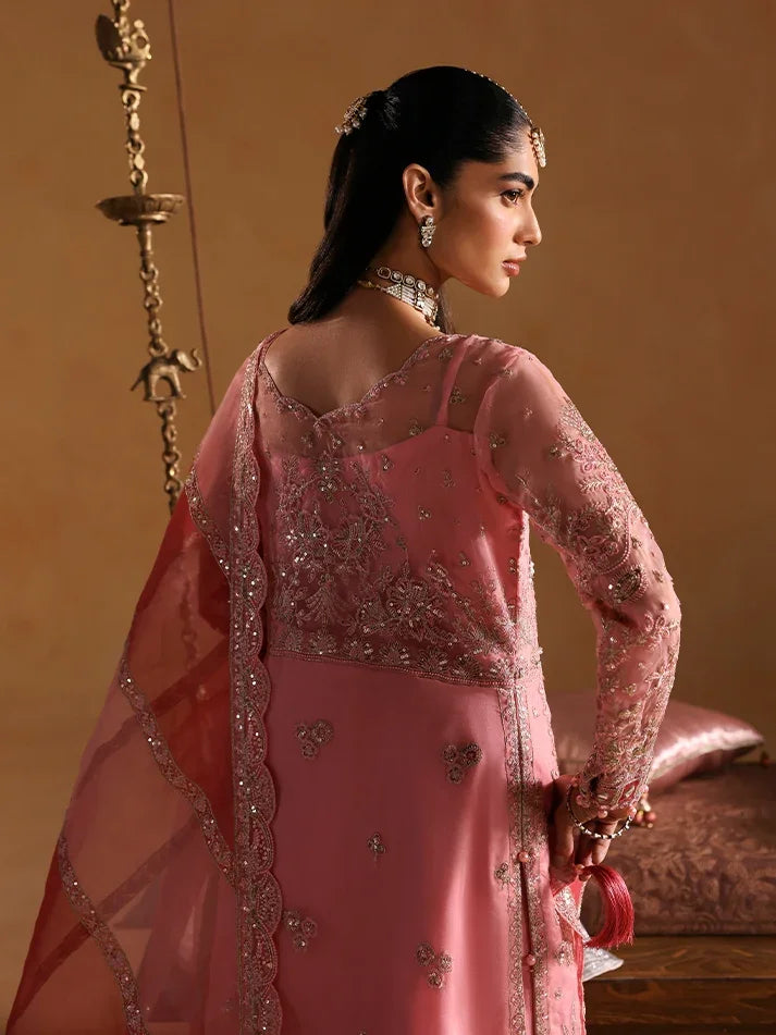 "Detailed drape view of the flamingo pink embroidered chatta patti organza dupatta paired with the Gulaal Areeman formal suit from Mirha Collections."