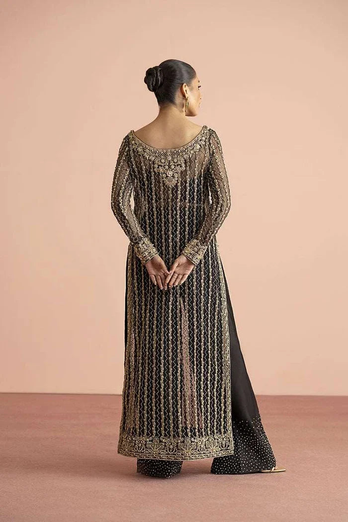 "Focus on matching embellished dupatta drape and sleeve border details of the Vera black and gold Azaar suit."