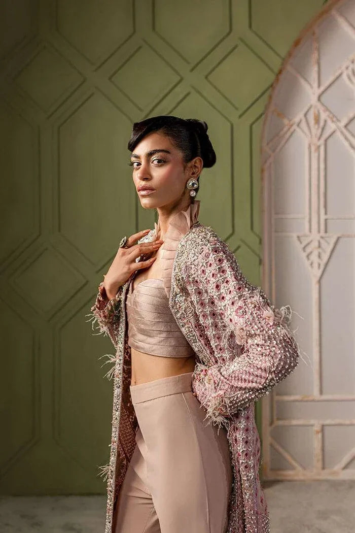 "Focus on the sleek silhouette and sleeve border finishing of the Vera blush pink formal jacket set."