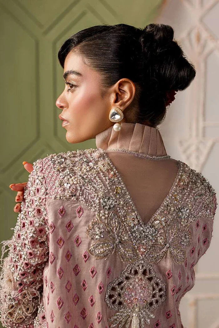"Close-up detailing on the Vera blush pink jacket featuring intricate hand-worked zardozi, crystals, and threadwork embroidery."