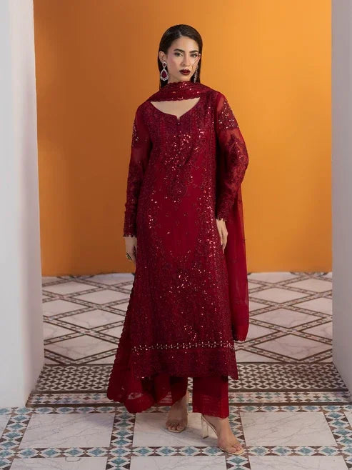 "Mirha Collections Gulaal Crimson deep red luxury embroidered stitched three-piece suit. Full-length front view featuring tailored red shirt, embellished dupatta, and trousers."