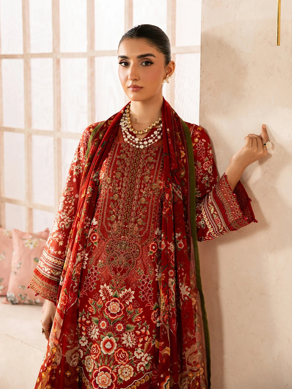 "Focus on the intricate sleeve cuff trimmings and lace hemline details of the Gulaal Calyx stitched luxury suit, showing boutique-quality tailoring."