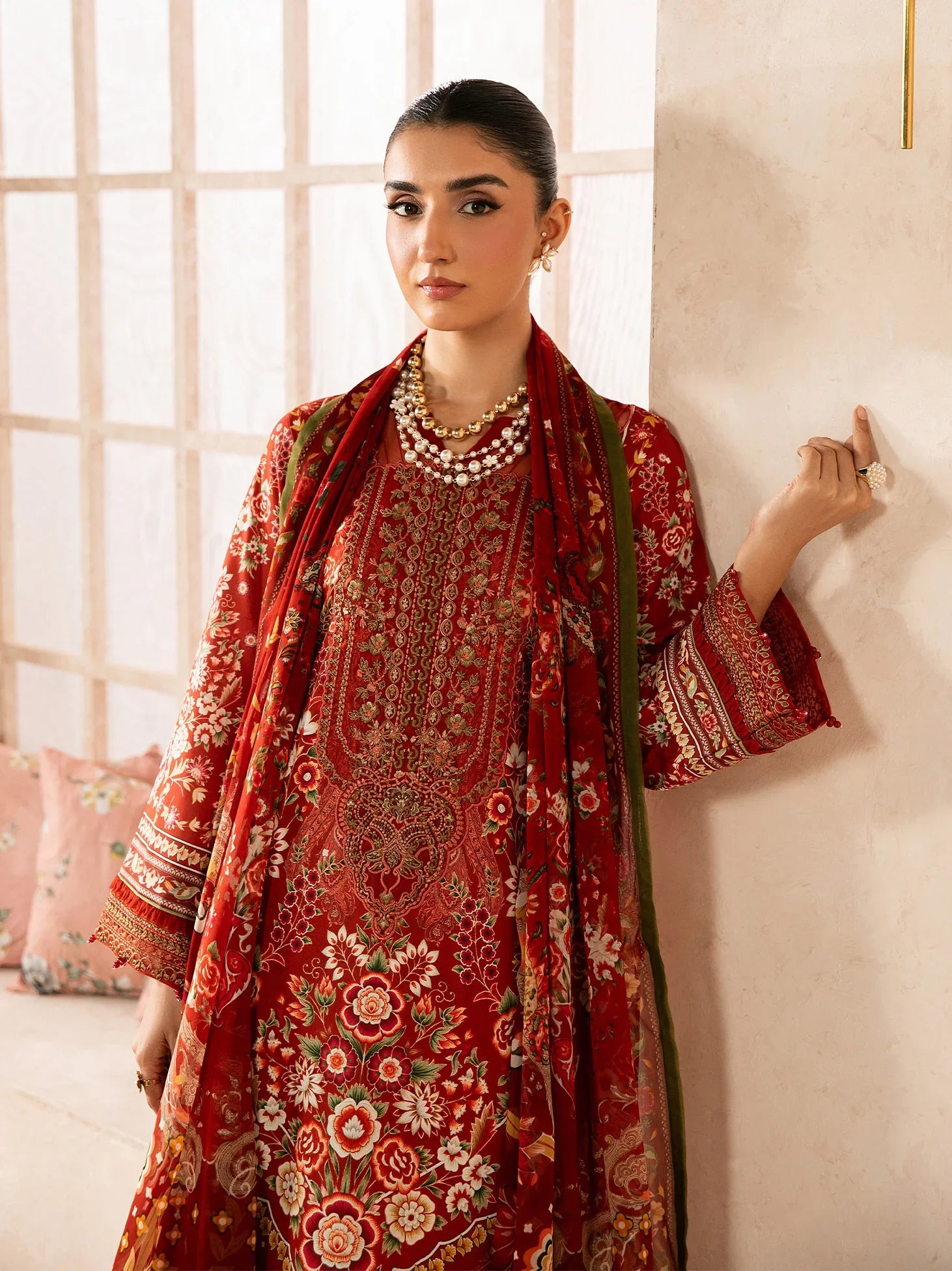 "Focus on the intricate sleeve cuff trimmings and lace hemline details of the Gulaal Calyx stitched luxury suit, showing boutique-quality tailoring."