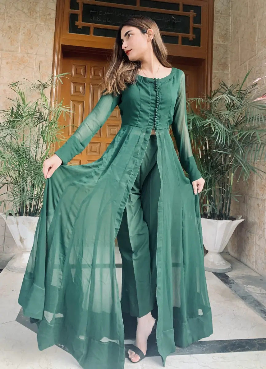 "Mirha Collections LXM Classic Emerald Green chiffon Kalidaar stitched suit. Full-length flared Pishwas frock view paired with tailored grip trousers."