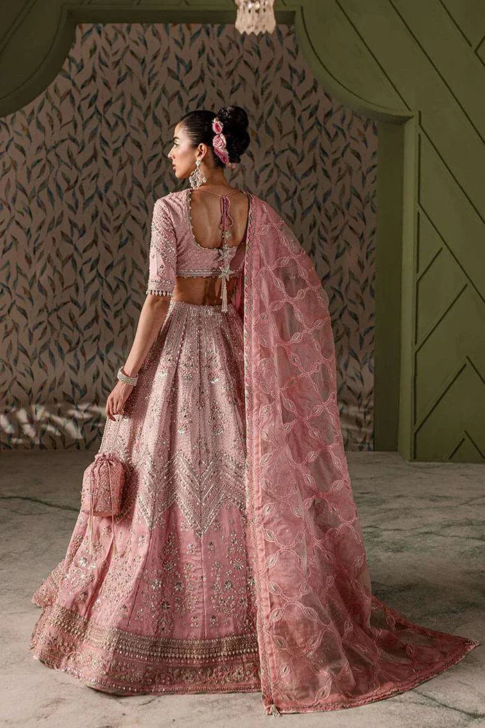 "Focus on color-blocked organza dupatta drape with ari work details paired with the Vera pink lehnga choli."