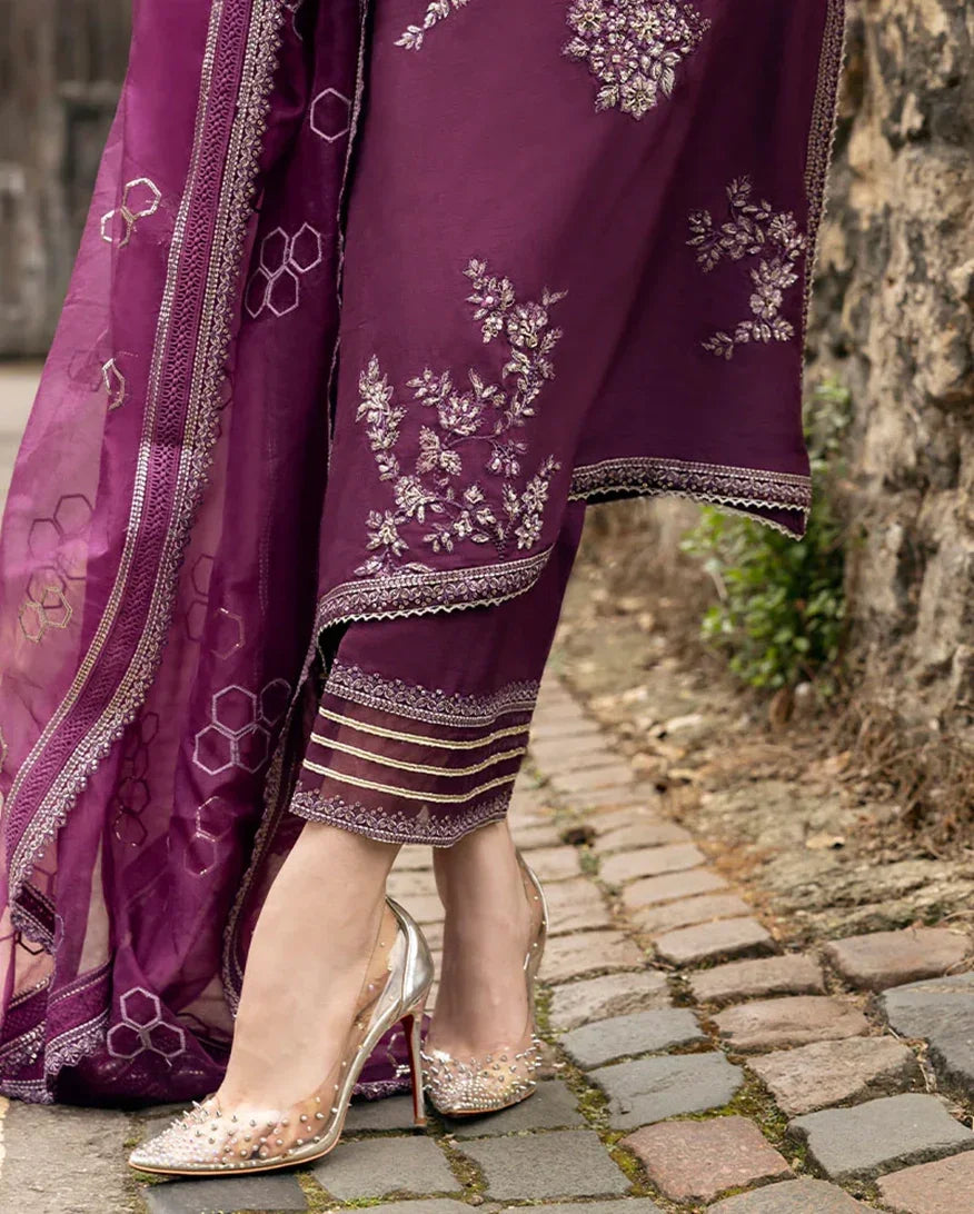 "Focus on the intricate sleeve cuff trimmings and lace hemline details of the Mushq Cosmic Dusk stitched raw silk luxury suit, showing boutique-quality tailoring."