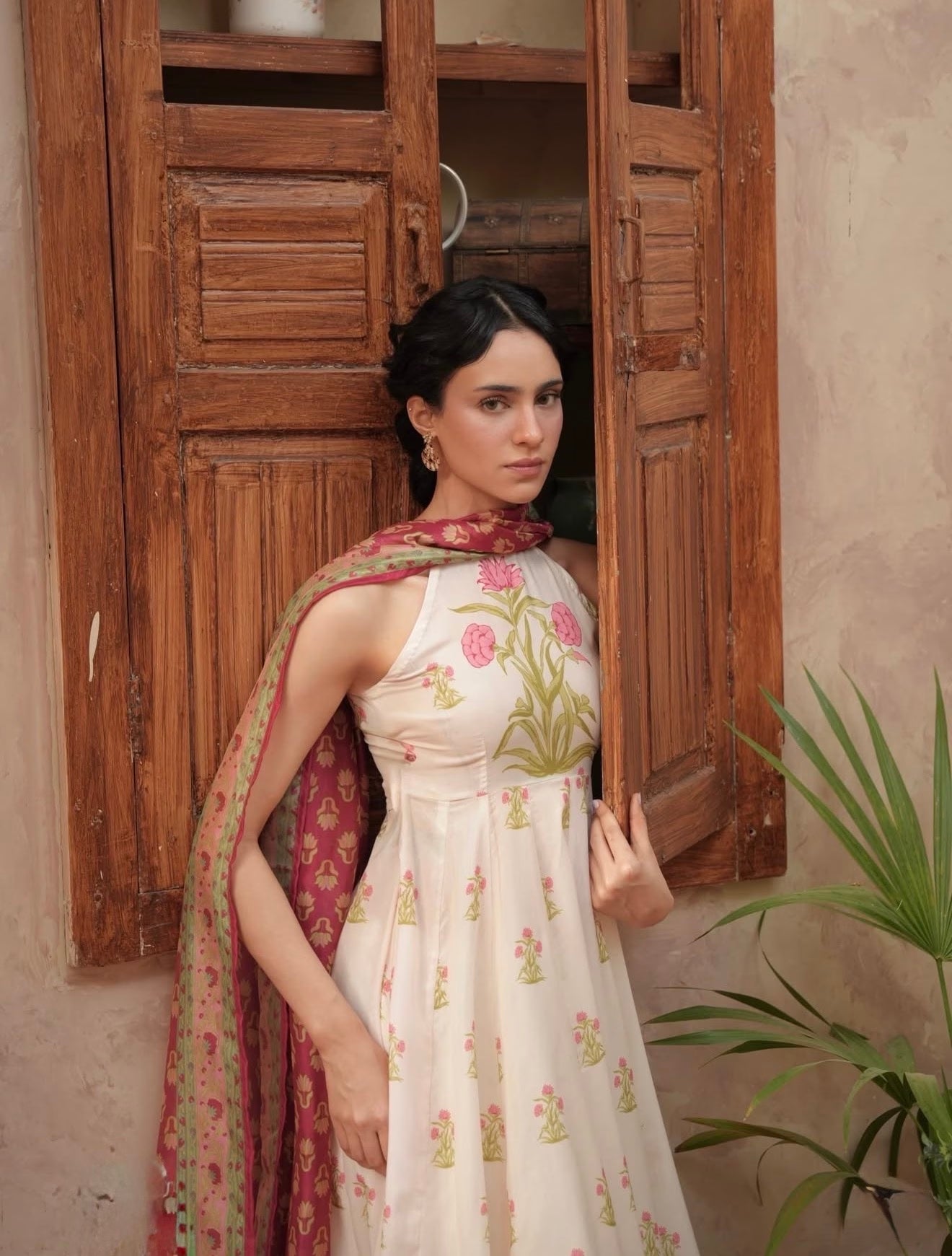 "Close-up view of the LXM Cream White Kalidaar shirt bodice, highlighting fine threadwork embroidery, subtle neck finishes, and soft fabric texture."