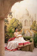 "Mirha Collections LXM Cream White Kalidaar stitched three-piece suit. Full-length flared Pishwas frock view featuring delicate embroidery, matching dupatta, and trousers."