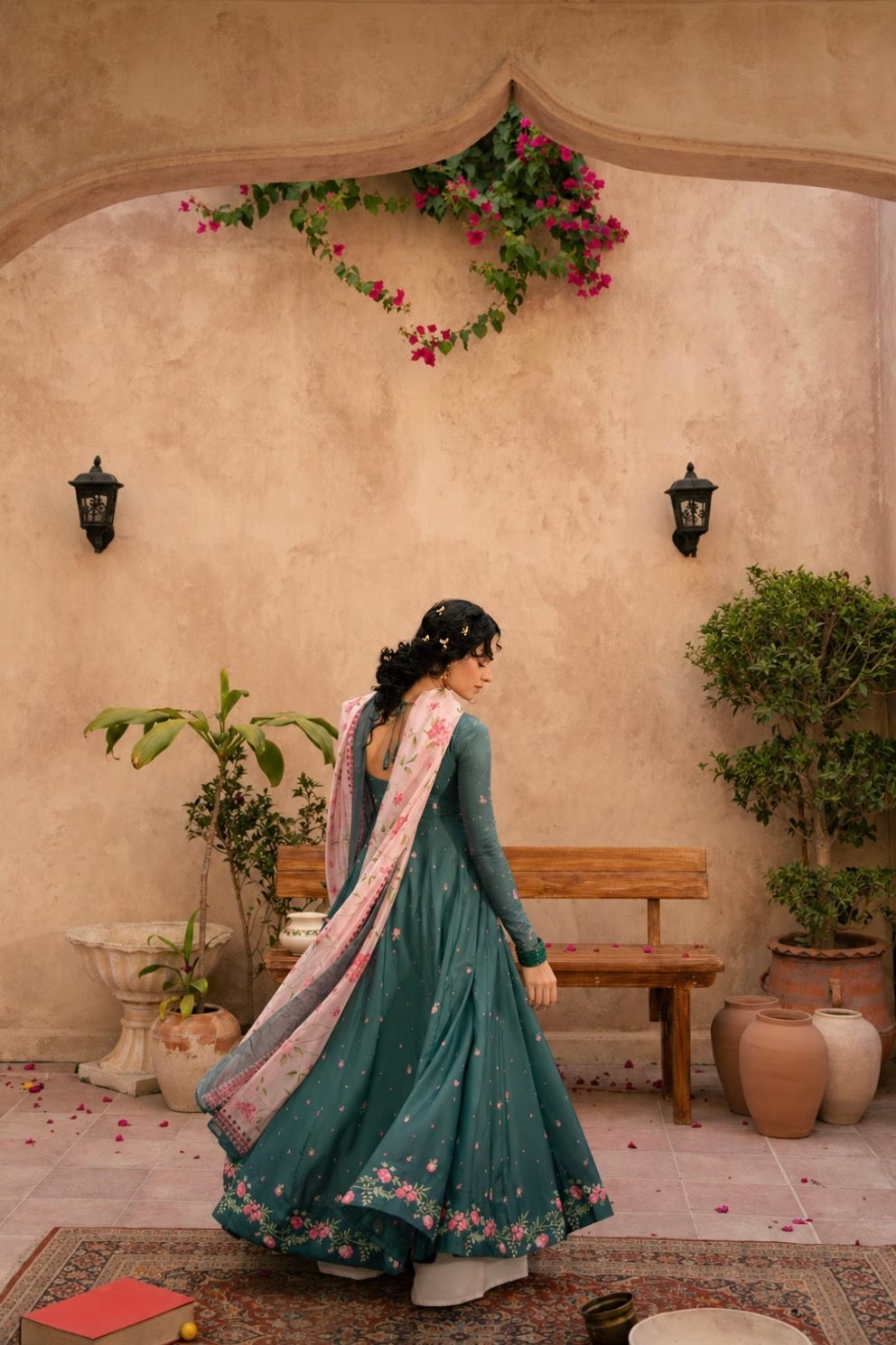 "Focus on the wide flared hemline border and sleeve cuff details of the LXM Deep Green stitched Kalidaar frock, showing boutique-quality tailoring."