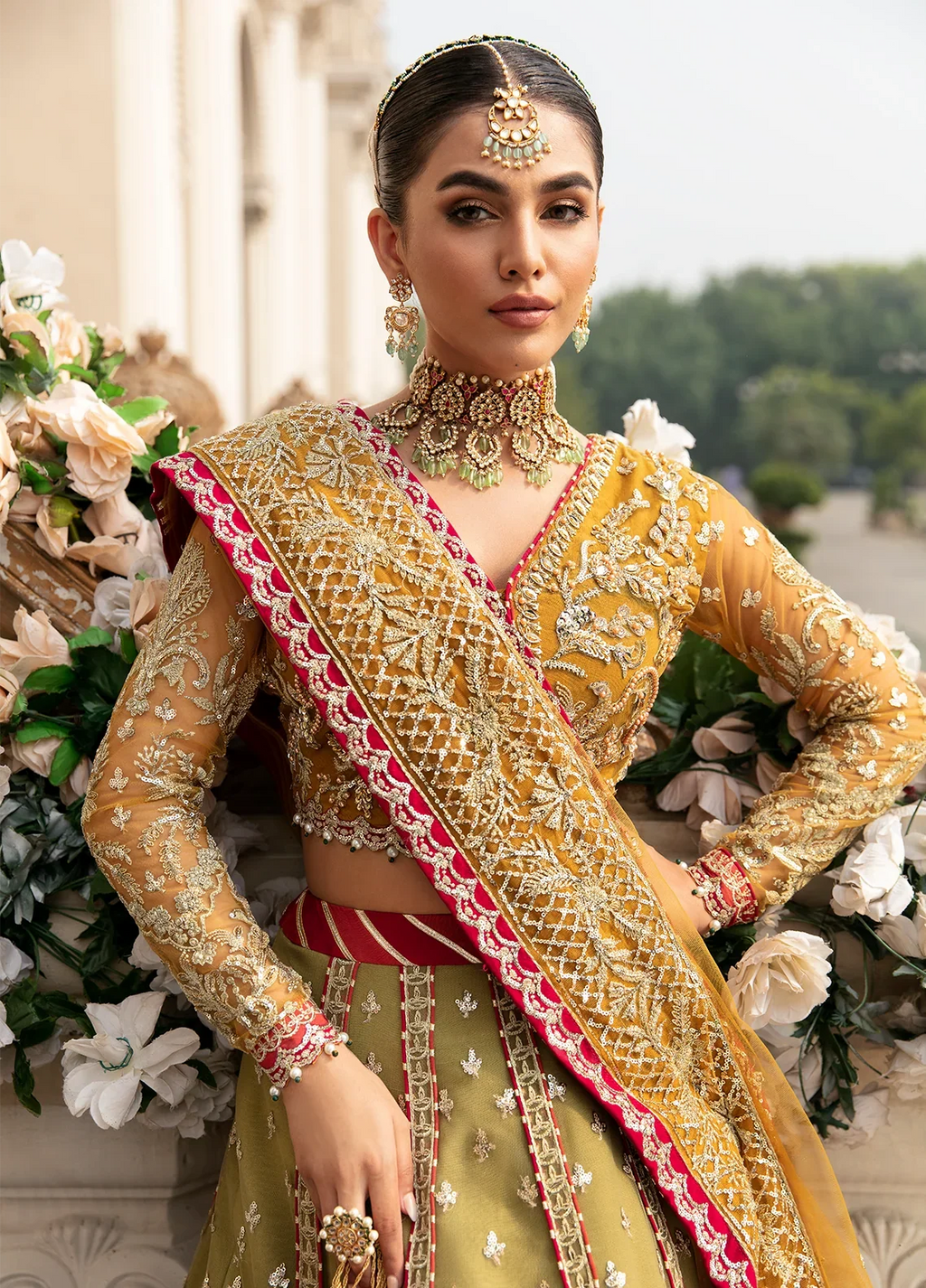 "Close-up detailing on the Gulaal Diya shirt bodice, displaying hand-worked adda embellishments, sheesha accents, panni embroidery, and fine fabric texture."