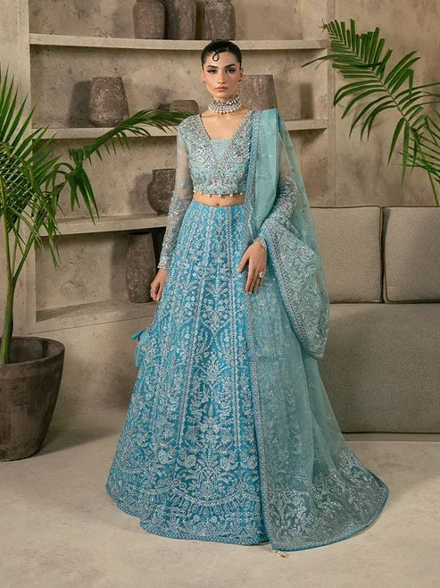 "Mirha Collections Gulaal Elaria rich plum luxury hand-embellished stitched three-piece organza suit. Full-length front view featuring tailored shirt, embellished dupatta, and raw silk trousers."