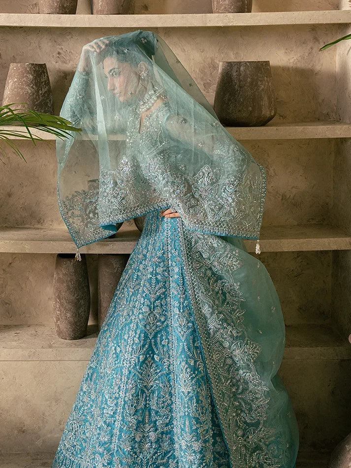 "Detailed drape view of the fluid luxury embroidered organza statement dupatta with scalloped borders paired with the Gulaal Elaria formal suit from Mirha Collections."