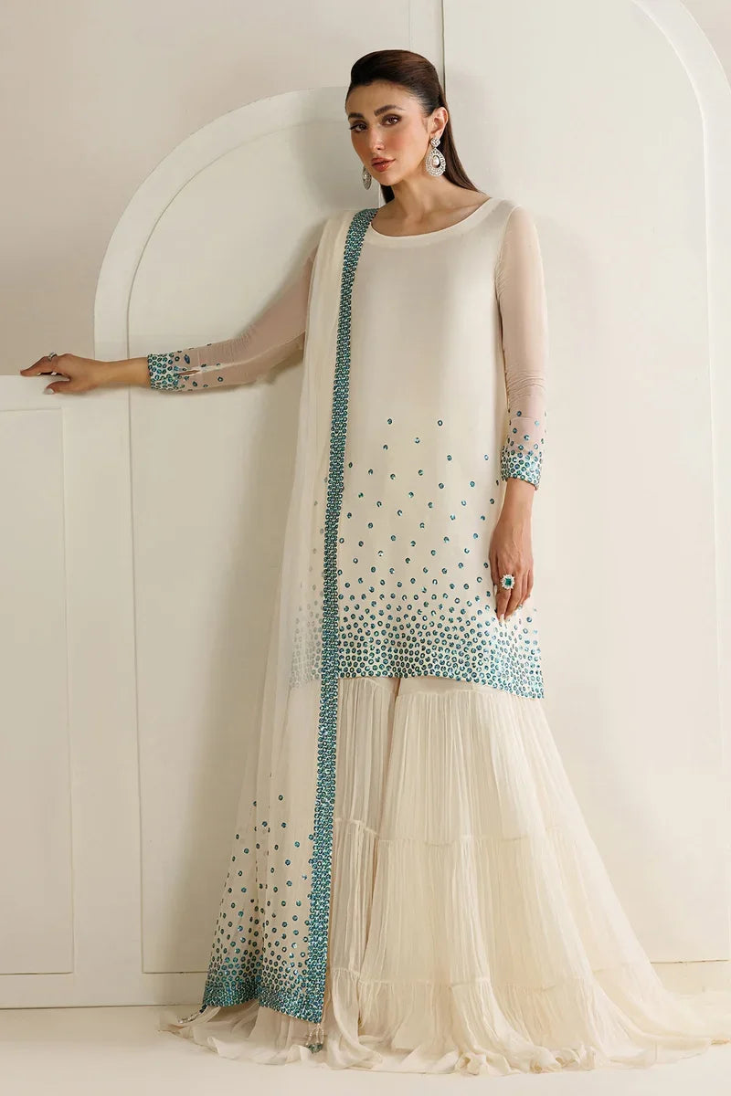 "Focus on sleeve cuff trimmings and embroidered hemline details of the Jazmin UC-3133 stitched luxury chiffon suit."