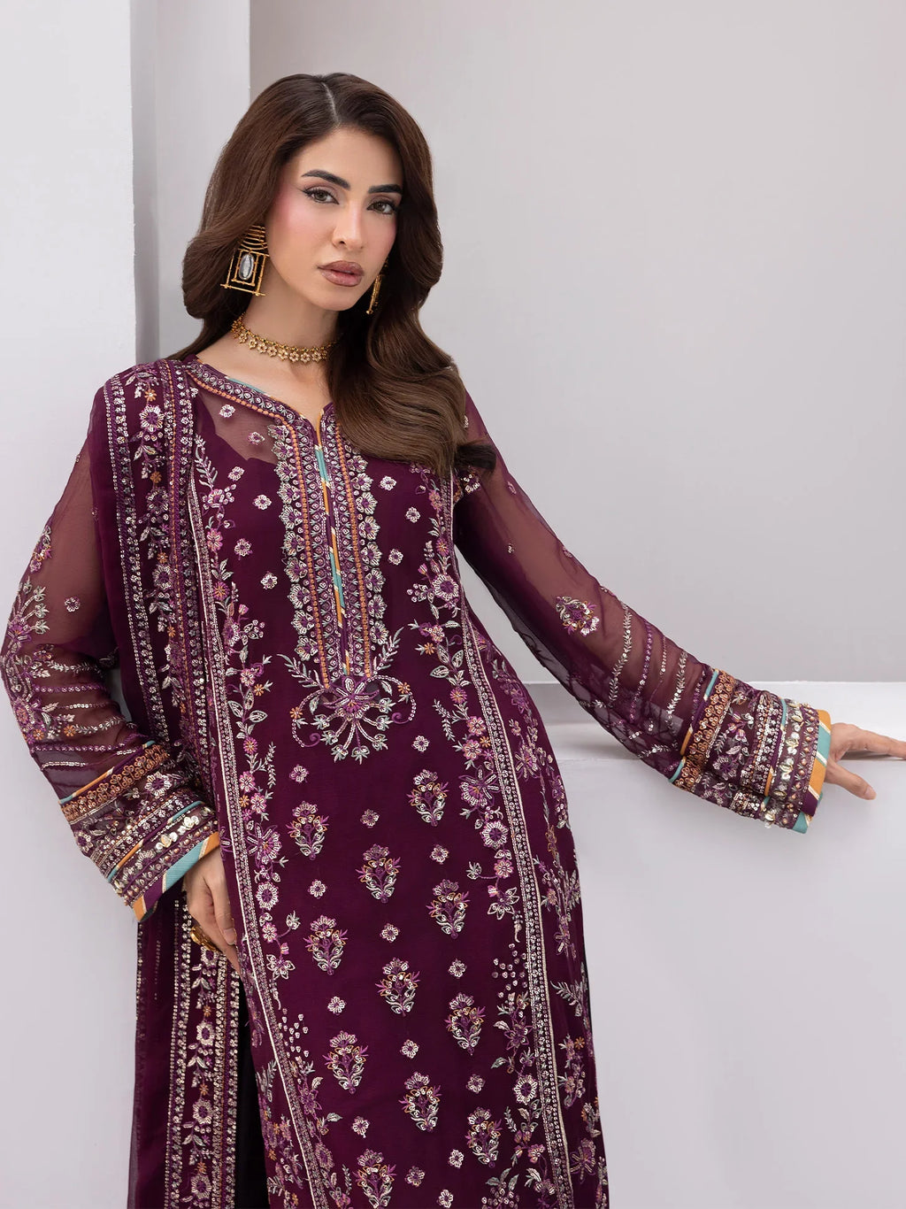 "Close-up detailing on the Gulaal Étincelle shirt bodice, displaying fine threadwork embroidery, sparkling sequin accents, and soft fabric texture."
