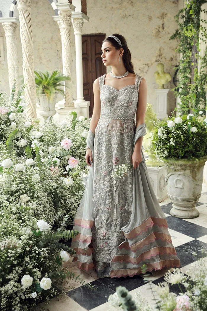 "Focus on matching heavy statement organza dupatta framed with four-sided embroidered borders paired with Mysie by Tahira Ezra set."