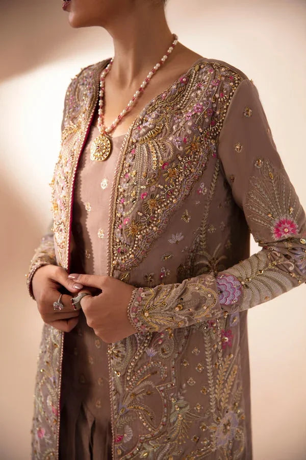 "Close-up of hand-worked zardozi, crystal accents, and fine resham threadwork embroidery on Mysie by Tahira Faia shirt bodice."