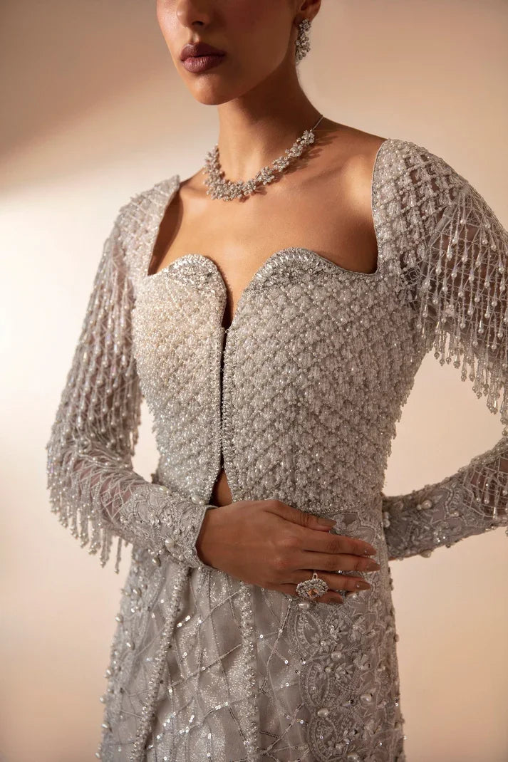 "Close-up of hand-worked zardozi, crystal accents, and fine resham threadwork embroidery on Mysie by Tahira Fere shirt bodice."