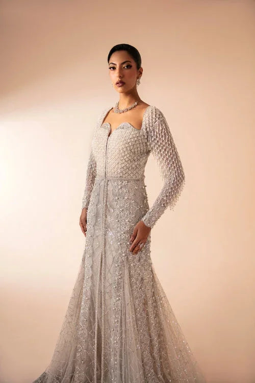 "Detailed view of intricate embroidered organza borders and cutwork daman finishings on Mysie by Tahira Fere formal suit."