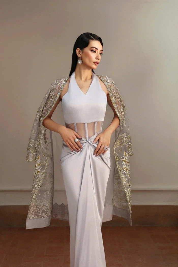 "Focus on matching embellished organza dupatta framed with four-sided embroidered borders paired with Mysie by Tahira Fere set."