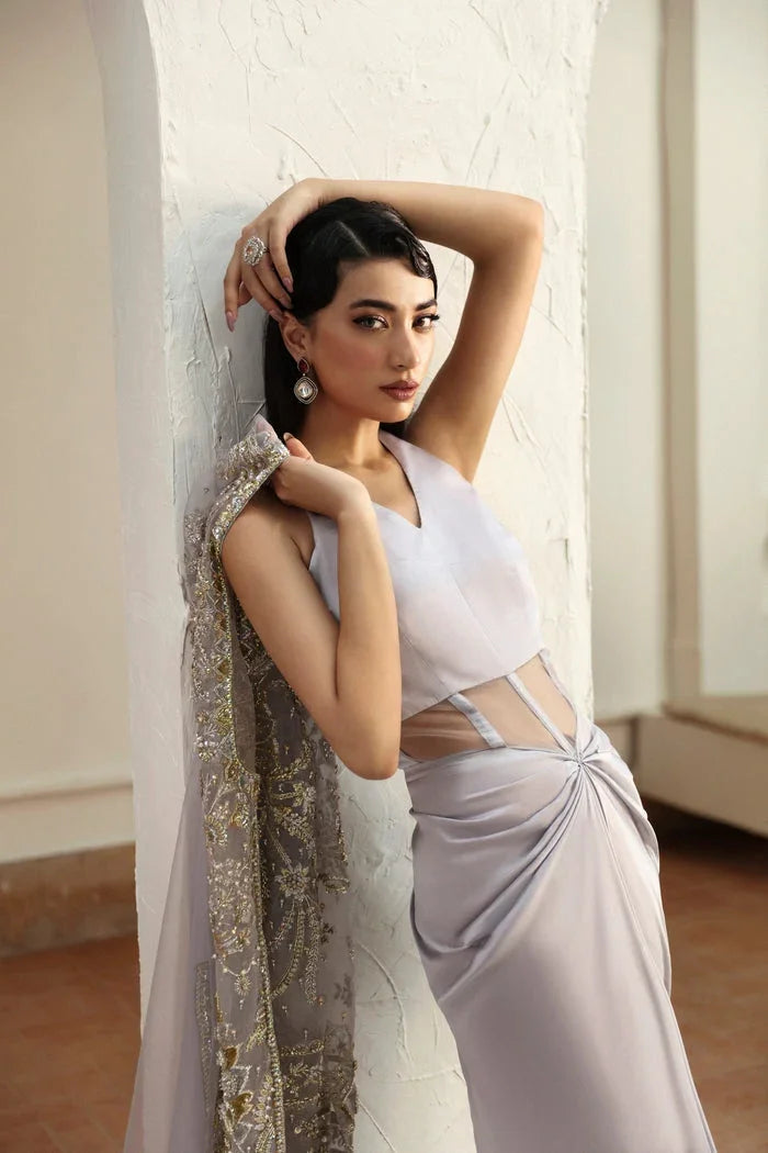 "Detailed view of intricate embroidered organza borders and cutwork daman finishings on Mysie by Tahira Fere formal suit."