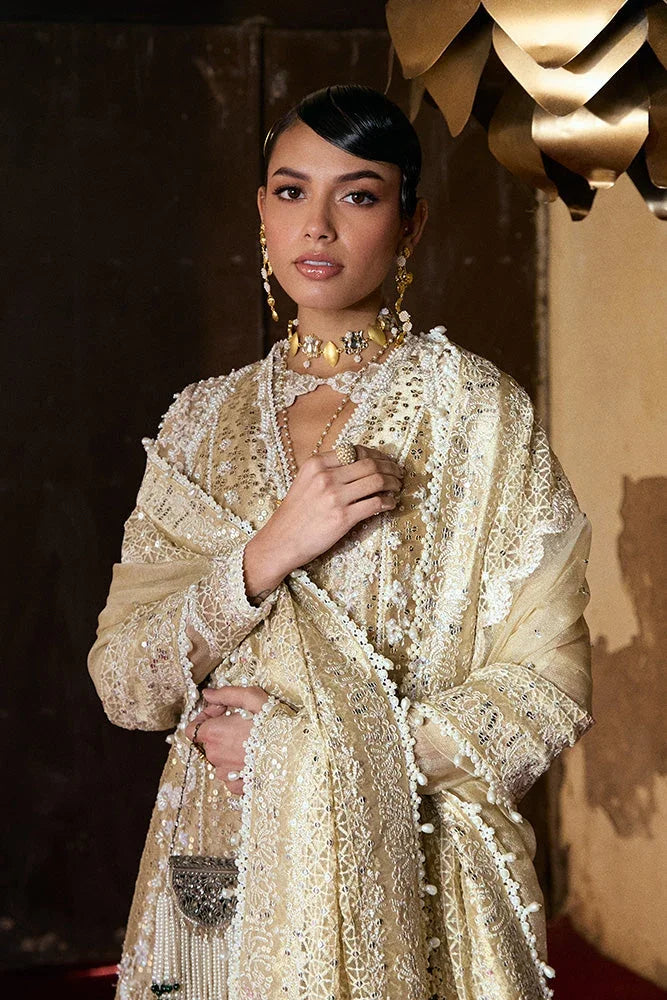 "Close-up of hand-worked zardozi, sparkling sequin accents, and resham threadwork embroidery on the Suffuse Gulraiz shirt bodice."
