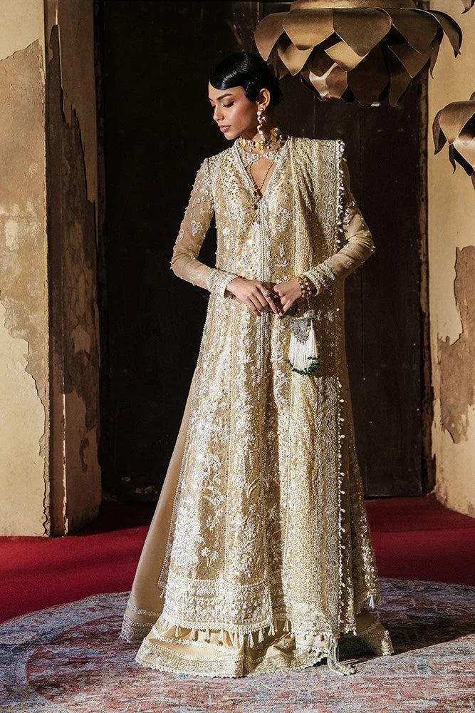 "Detailed view of intricate embroidered organza borders and embellishments on the hemline of Suffuse Gulraiz wedding formal."