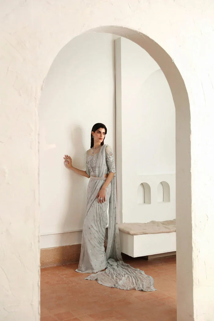 "Mirha Collections Mysie by Tahira Hafsa elegant ice blue net and chiffon designer saree with embellished choli."