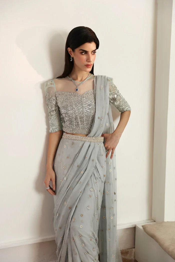"Full back profile view of tailored ice blue choli and draped pallu for Mysie by Tahira Hafsa."