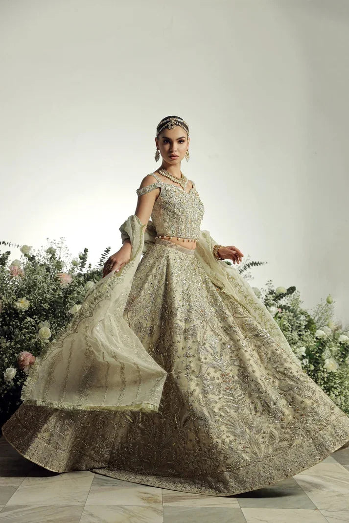"Detailed view of intricate borders, cutwork daman finishing, and heavy embellishments on Mysie by Tahira Hansel formal suit."