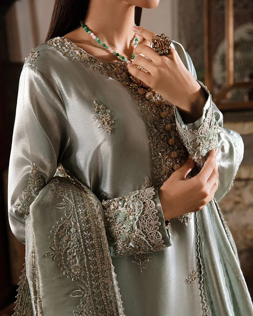 "Close-up detailing on the Mushq Heer shirt bodice, displaying fine threadwork embroidery, embellished neck finishes, and soft fabric texture."