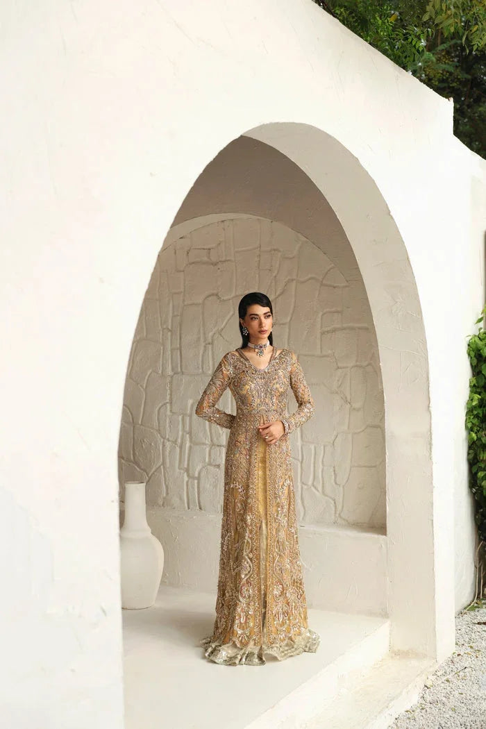 "Mirha Collections Mysie by Tahira Humaira vibrant yellow tulle front-open shirt paired with tailored mermaid panel skirt."