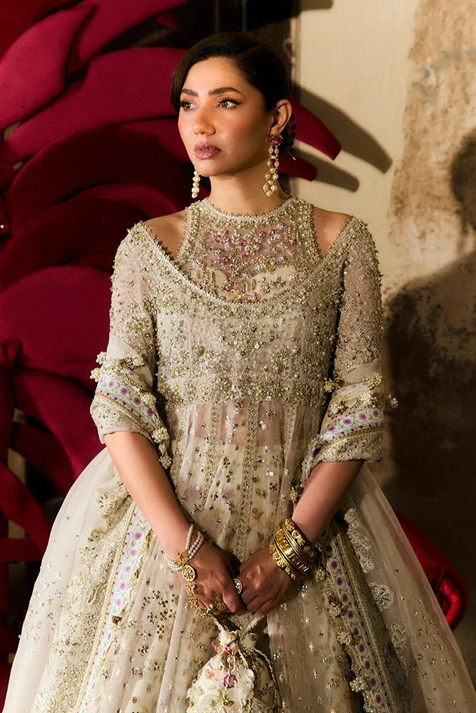 "Close-up of hand-worked zardozi, sparkling sequin accents, and resham threadwork embroidery on the Suffuse Ishani shirt bodice."