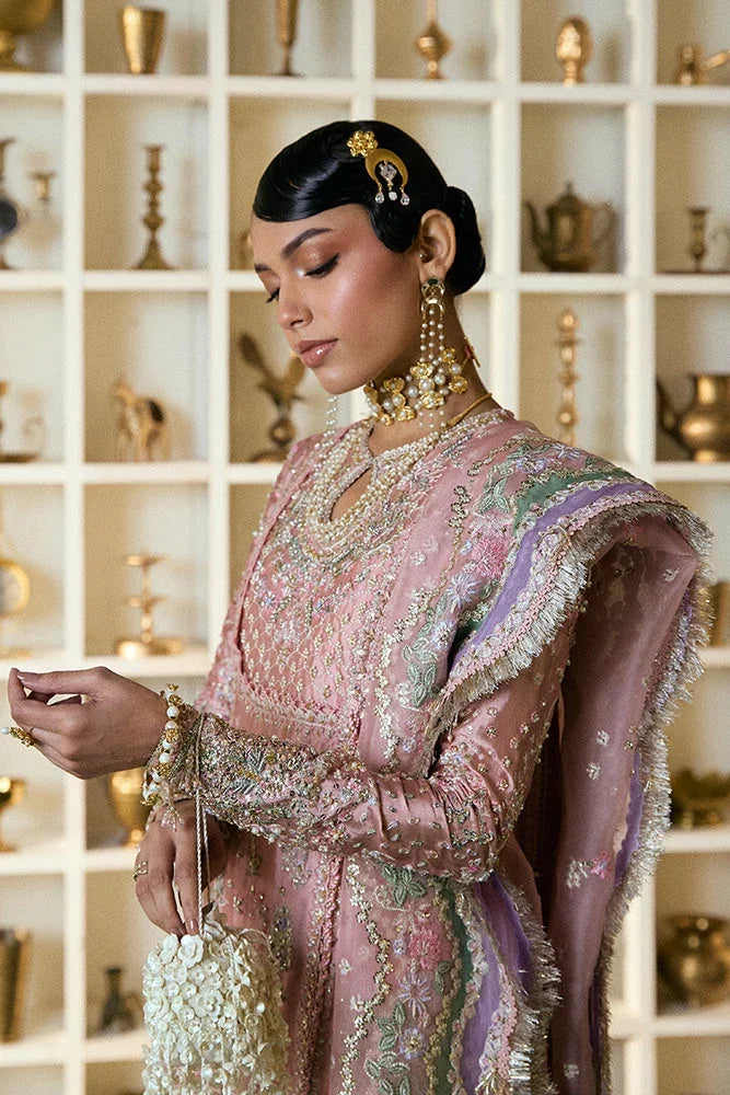 "Close-up of hand-worked zardozi, sparkling sequin accents, and resham threadwork embroidery on the Suffuse Israna shirt bodice."