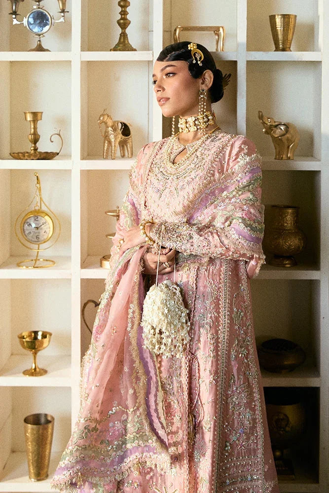 "Focus on matching embellished organza dupatta framed with four-sided embroidered borders paired with Suffuse Israna set."