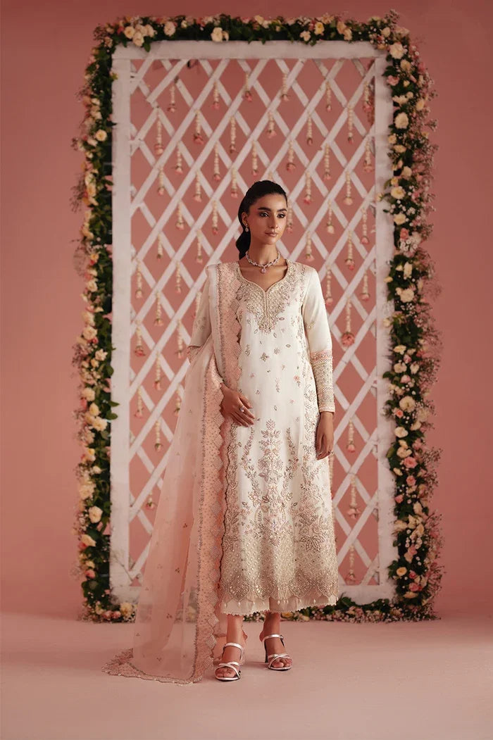 "Ivory raw silk embroidered three-piece suit with blush pink gota and pearl detailing – front view"
