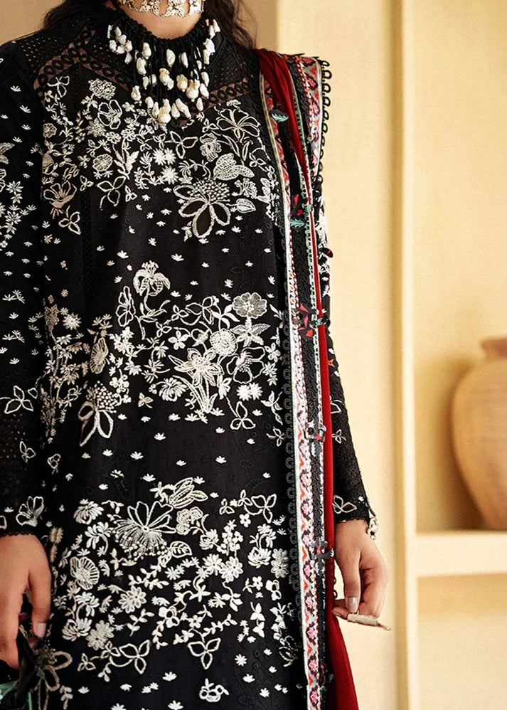 "Close-up of intricate threadwork embroidery, organza neckline patch, and subtle sequin accents on Suffuse Kiran shirt."