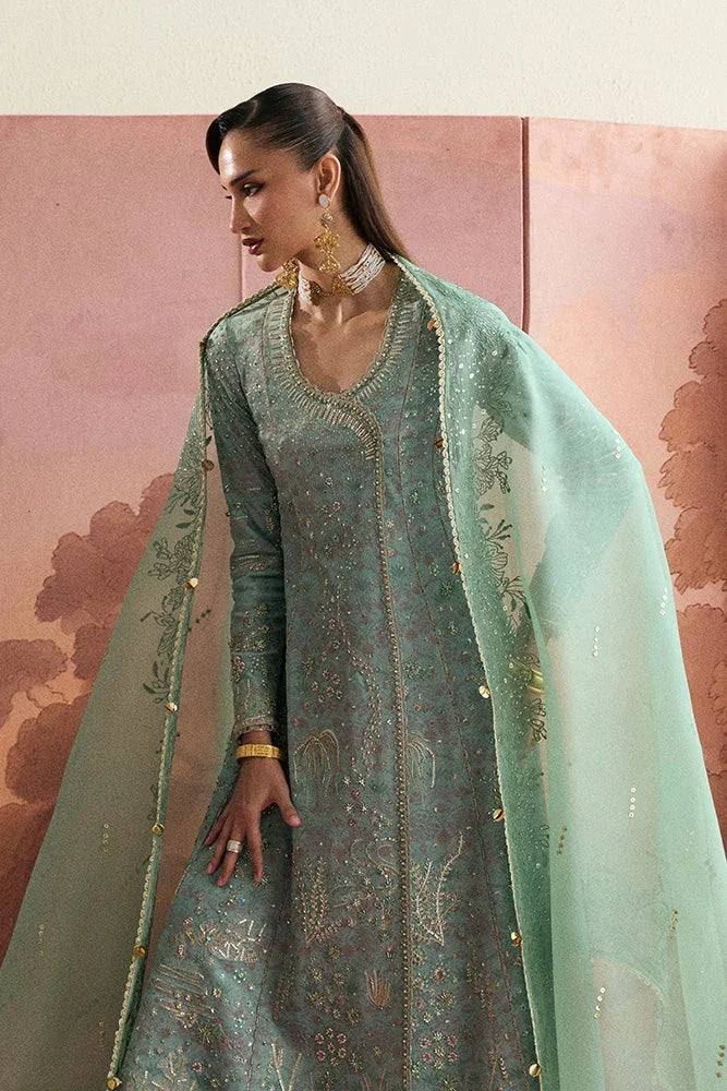 "Detailed view of the sage green printed velvet Aazar pants with layered lace borders by Suffuse."