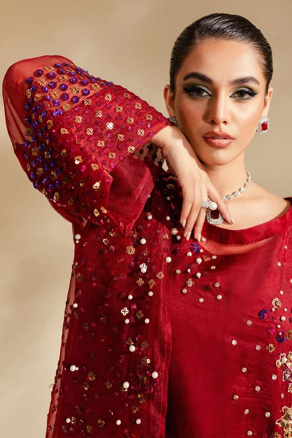 "Close-up of exquisite hand-worked embellishments, sparkling accents, and fine threadwork embroidery on Nureh Love Struck organza shirt."