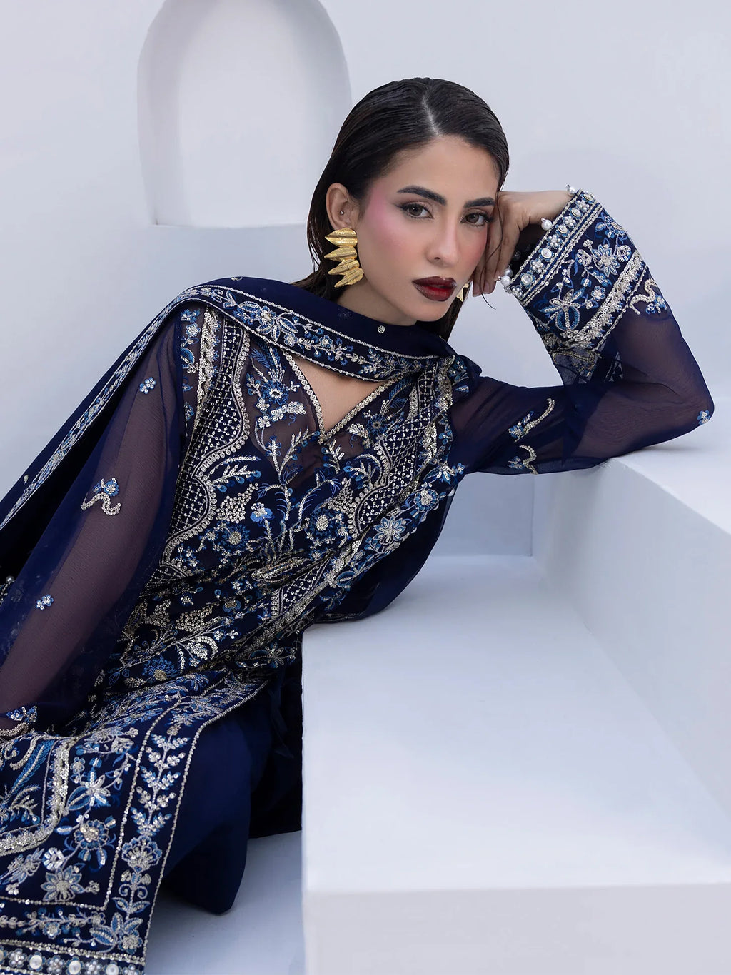 "Close-up detailing on the Gulaal Lueur shirt bodice, displaying fine threadwork embroidery, shimmering sequin accents, and soft fabric texture."