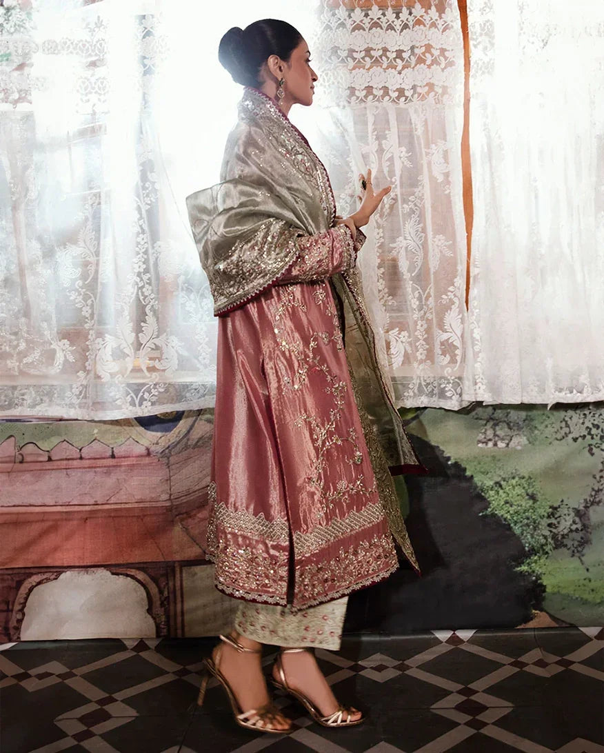 "Focus on the intricate sleeve cuff trimmings and lace hemline details of the Mushq Lamia stitched luxury suit, showing boutique-quality tailoring."