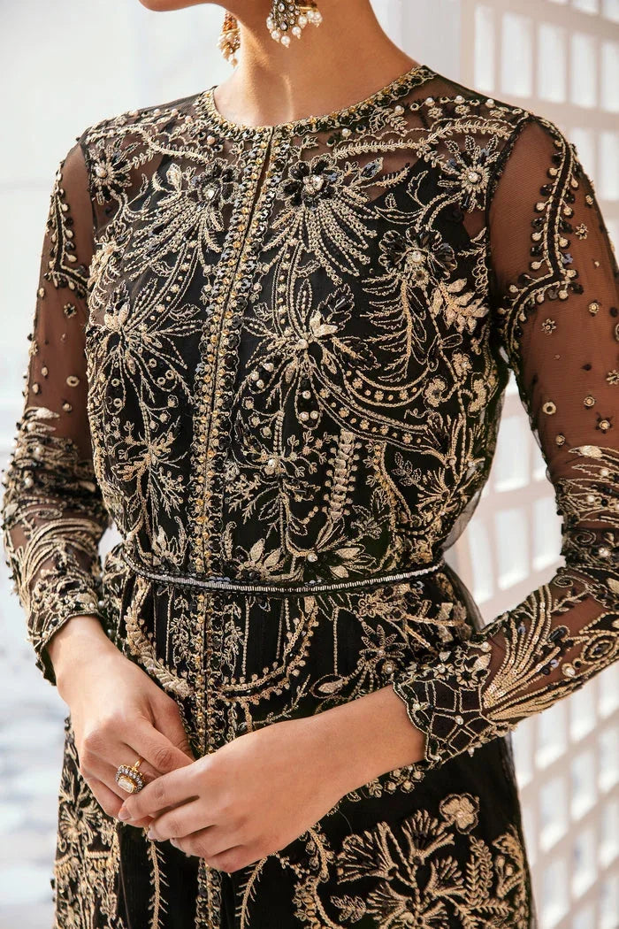 "Close-up of exquisite hand-worked zardozi, crystal accents, and resham threadwork embroidery on Mysie by Tahira Lata shirt."